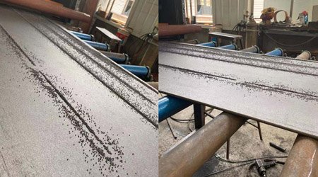 普華重工機(jī)械工程師快速解決輥道拋丸機(jī)堆砂問題